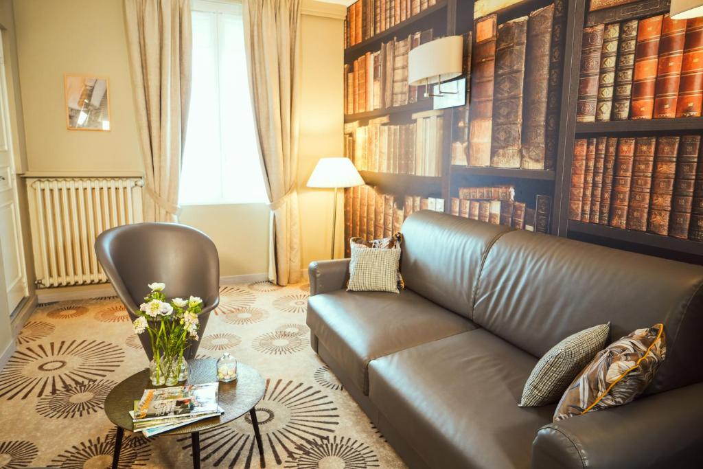 Posezení v ubytování Hotel Le Lion D'Or et Restaurant La Table Du Lion