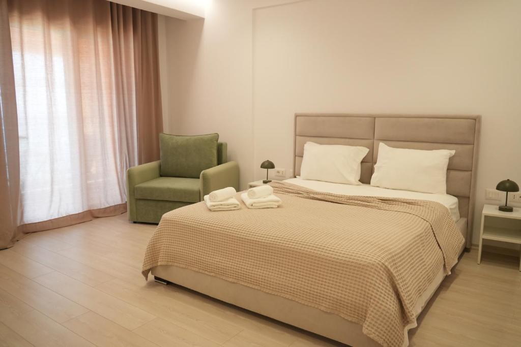 Postel nebo postele na pokoji v ubytování Hotel Veizi