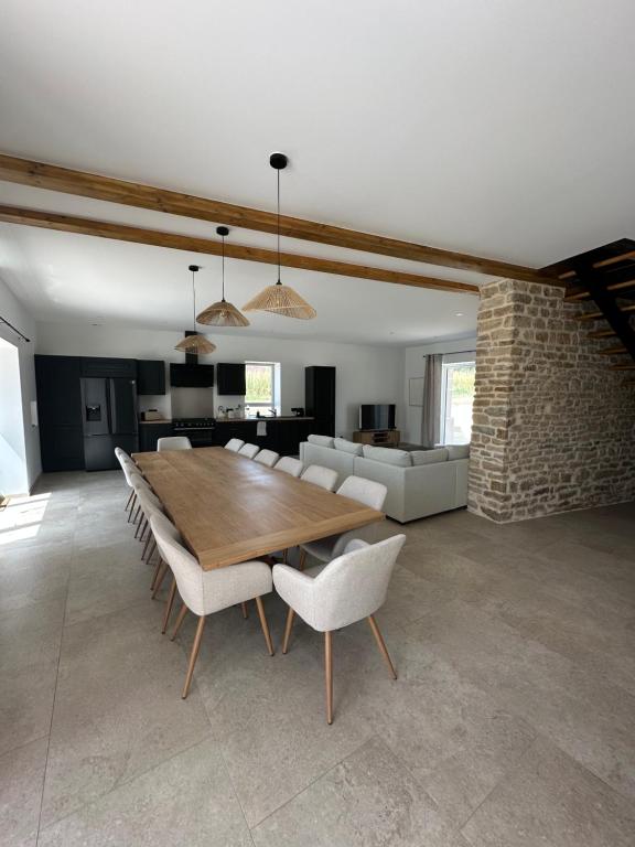 Posezení v ubytování Gîte 10 personnes avec spa privatif