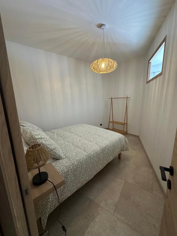 Postel nebo postele na pokoji v ubytování Gîte 10 personnes avec spa privatif