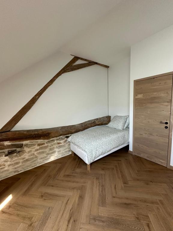 Postel nebo postele na pokoji v ubytování Gîte 10 personnes avec spa privatif