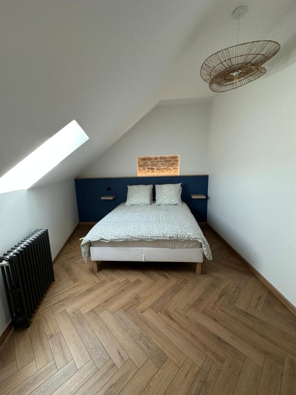 Postel nebo postele na pokoji v ubytování Gîte 10 personnes avec spa privatif