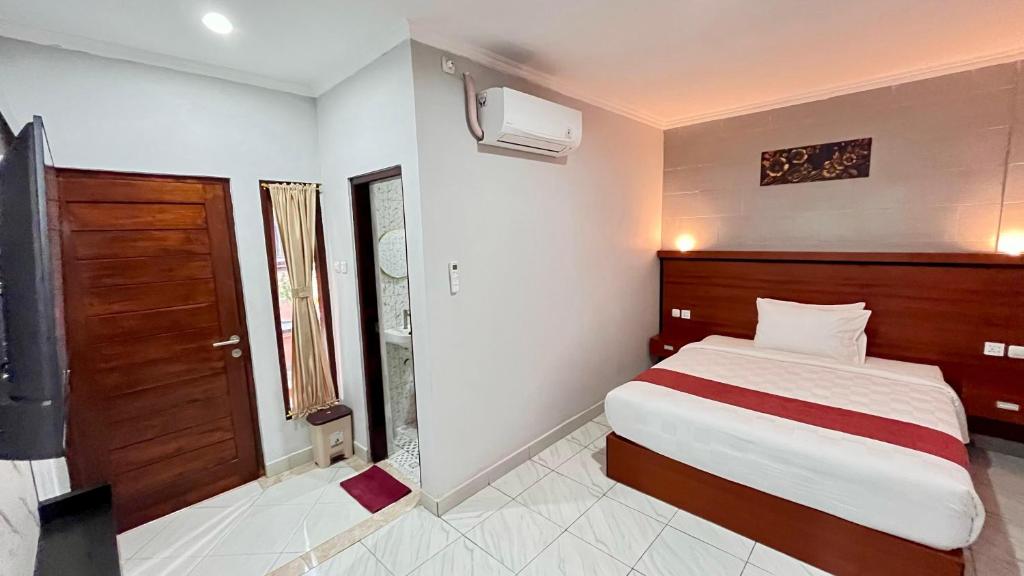 Postel nebo postele na pokoji v ubytování Dara House
