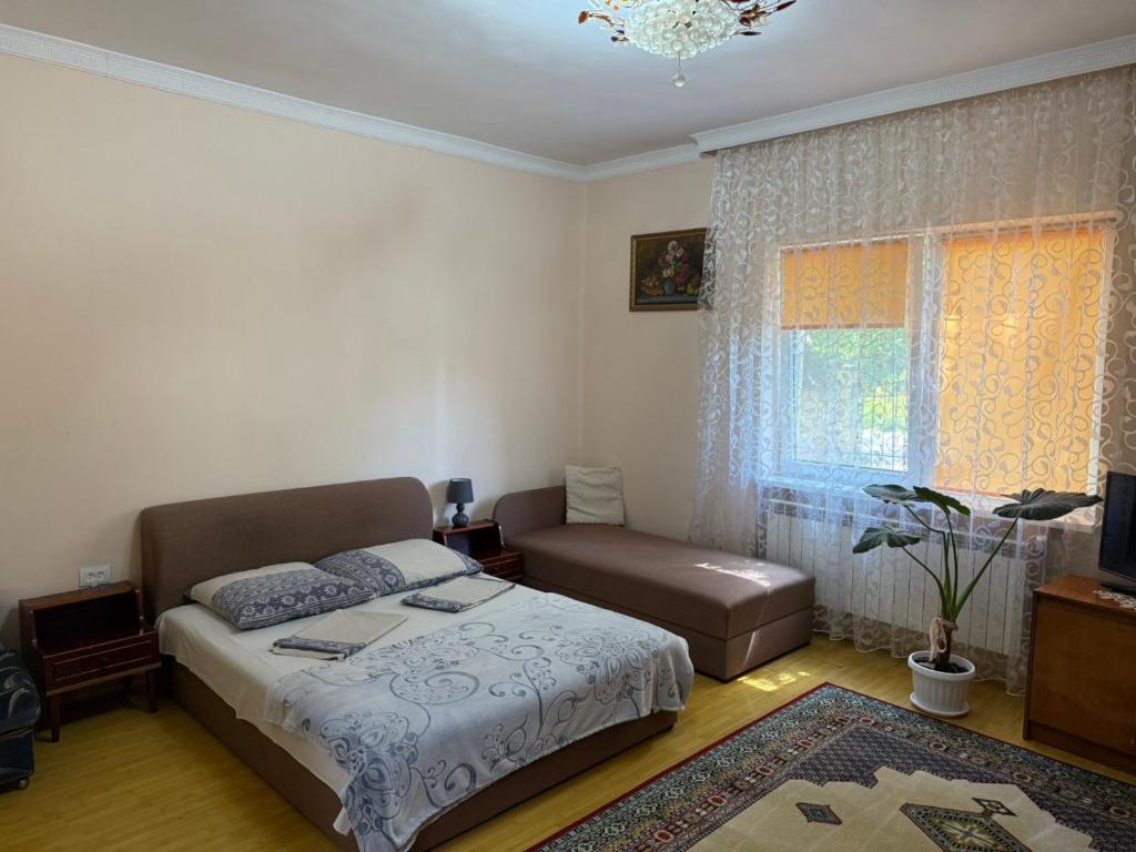 Postel nebo postele na pokoji v ubytování Lizak