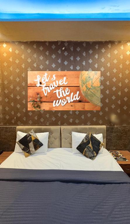 Postel nebo postele na pokoji v ubytování Hotel metroview