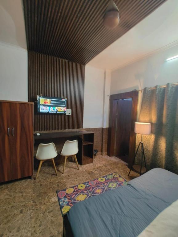 Postel nebo postele na pokoji v ubytování Hotel metroview
