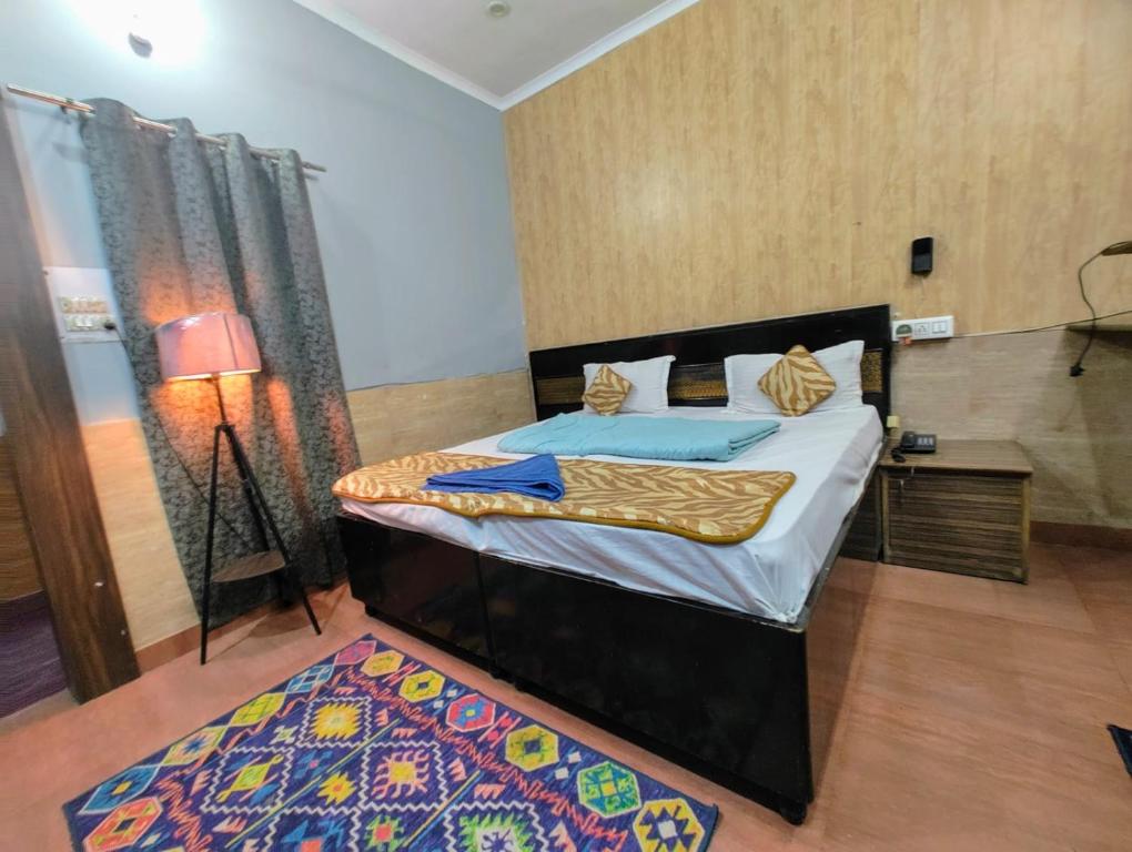 Postel nebo postele na pokoji v ubytování Hotel metroview