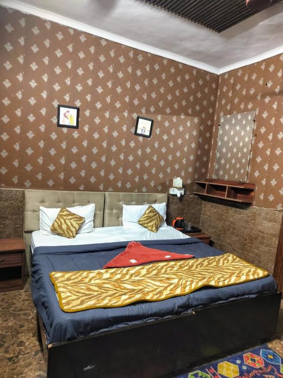 Postel nebo postele na pokoji v ubytování Hotel metroview
