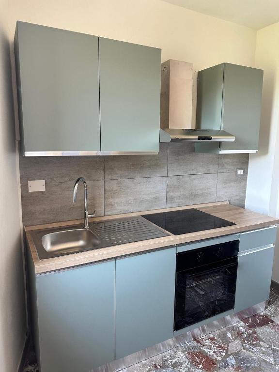 Kuchyň nebo kuchyňský kout v ubytování Hotel Monti