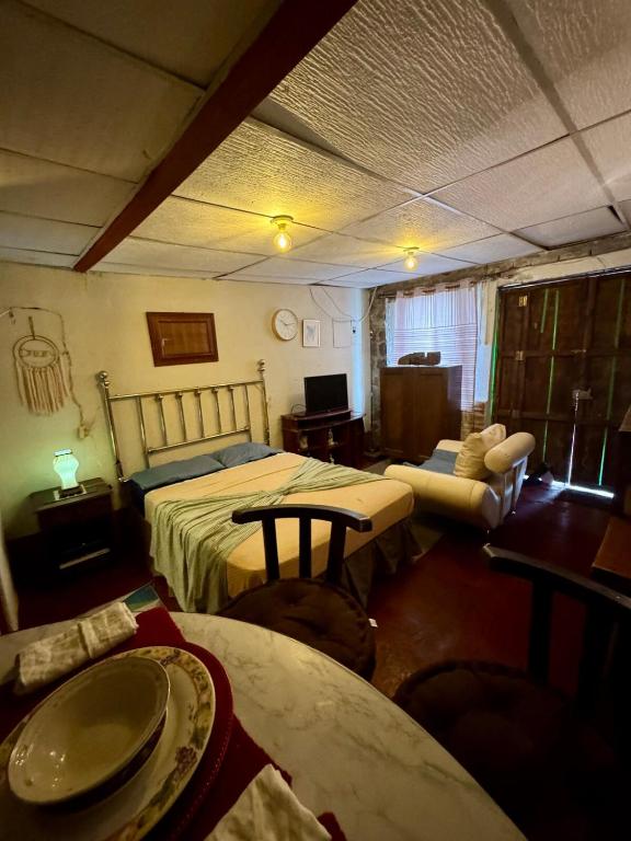 Ένα ή περισσότερα κρεβάτια σε δωμάτιο στο Studio in Plazuela Santa Ana