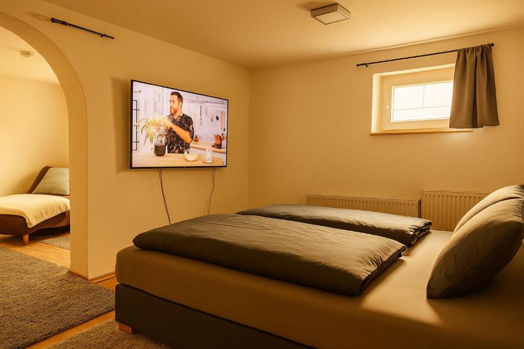 Postel nebo postele na pokoji v ubytování Appartment Schmidtner