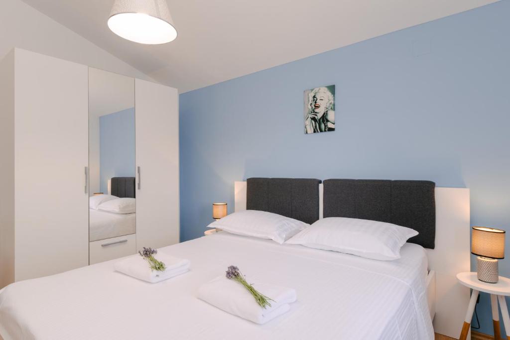 Posteľ alebo postele v izbe v ubytovaní Apartment Ljubica