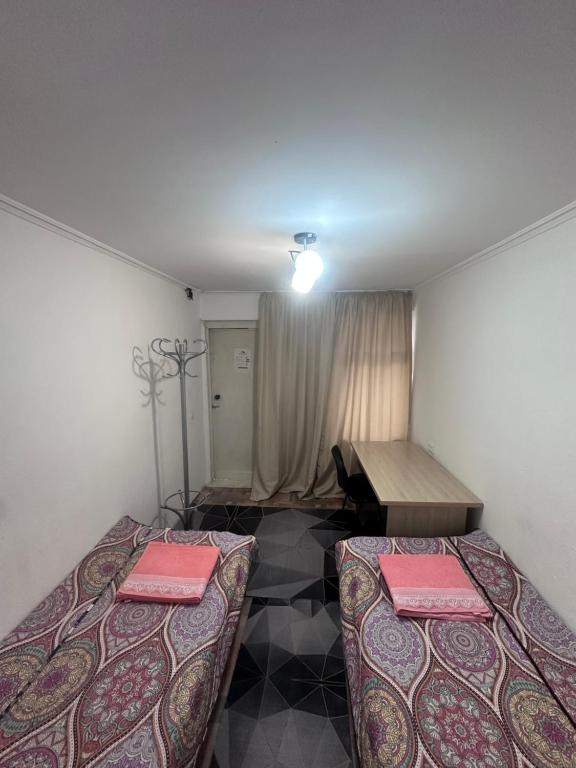 Postel nebo postele na pokoji v ubytování Dos Guesthouse
