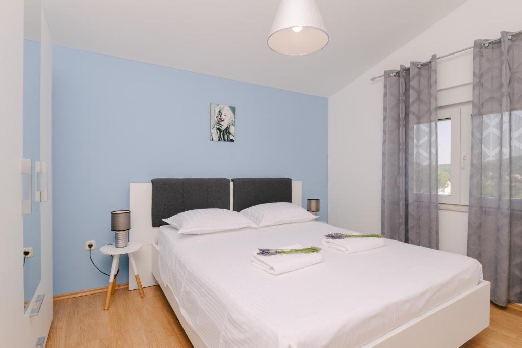 Posteľ alebo postele v izbe v ubytovaní Apartment Ljubica