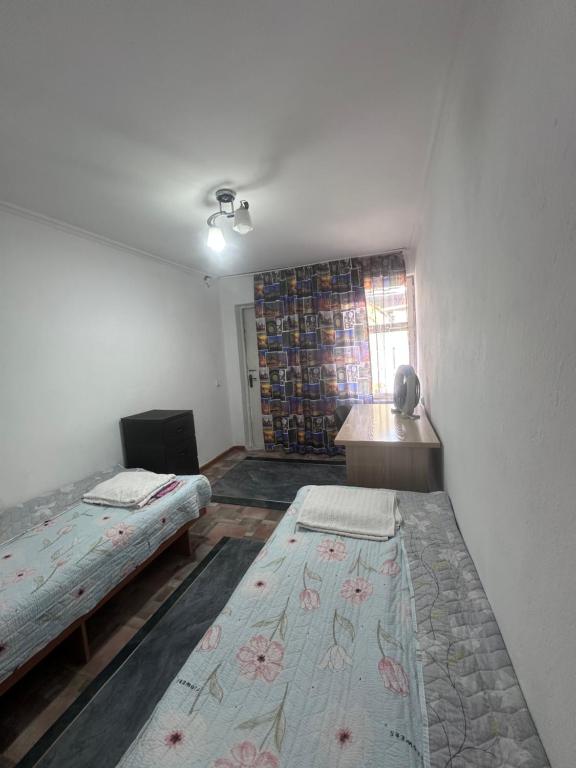 Postel nebo postele na pokoji v ubytování Dos Guesthouse