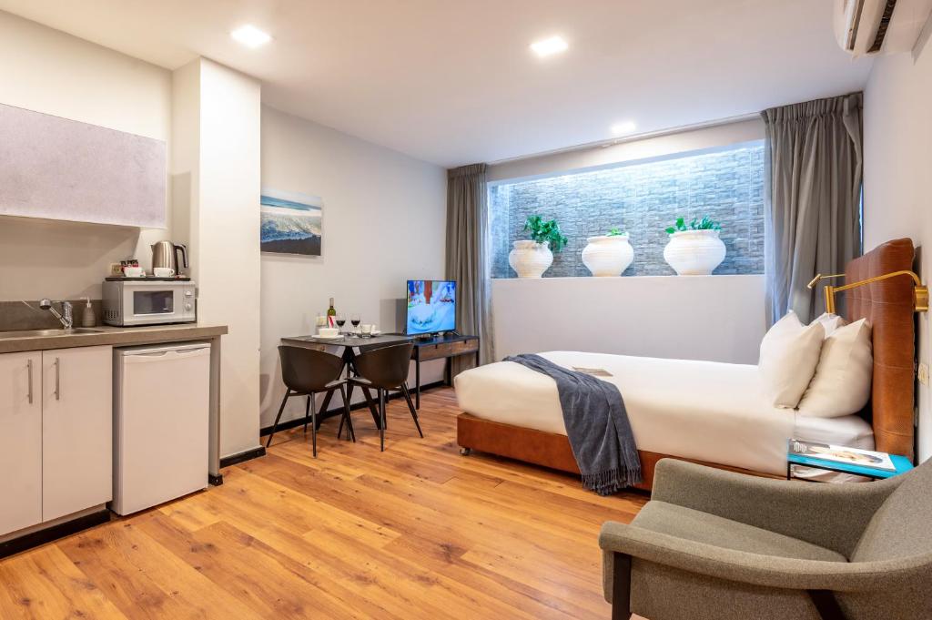 Kuchyň nebo kuchyňský kout v ubytování Sea Land Suites