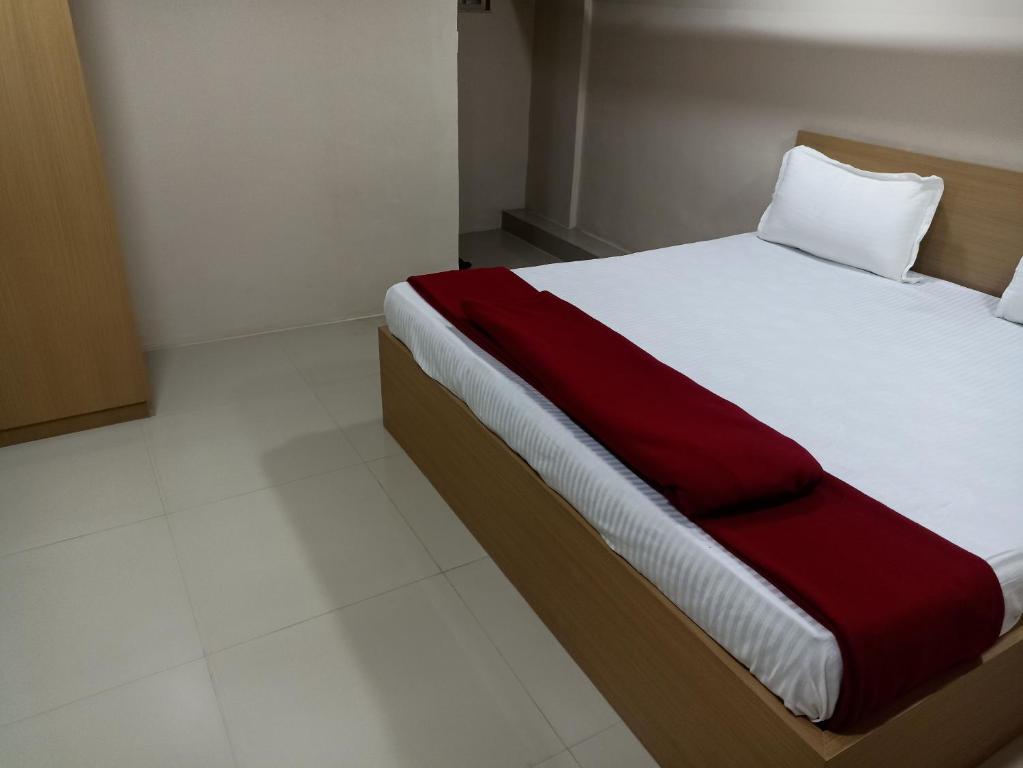 Postel nebo postele na pokoji v ubytování KK Guest House