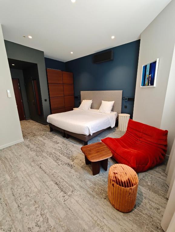 Postel nebo postele na pokoji v ubytování Hotel des Eaux