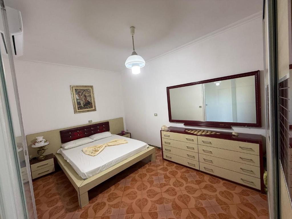 Ένα ή περισσότερα κρεβάτια σε δωμάτιο στο Babas House