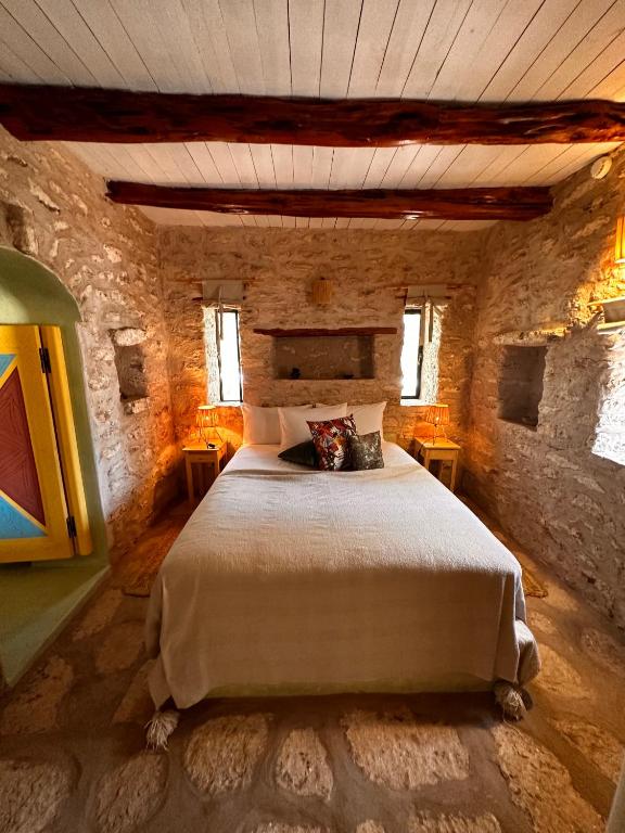 Postel nebo postele na pokoji v ubytování Atlantis 12, Maison d'hôtes et d'art