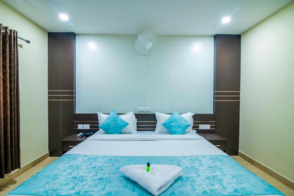 Postel nebo postele na pokoji v ubytování Hotel Shams Inn