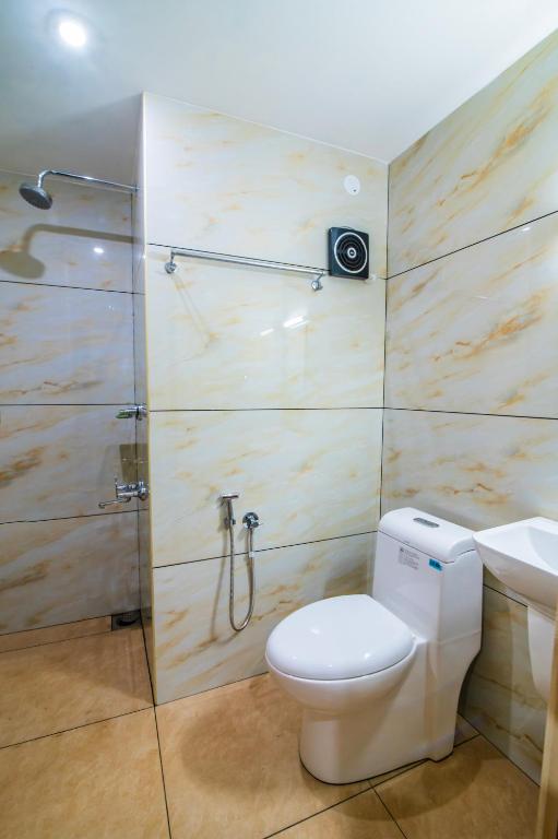 Koupelna v ubytování Hotel Shams Inn