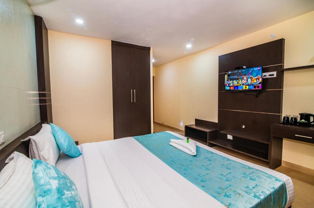 TV a/nebo společenská místnost v ubytování Hotel Shams Inn