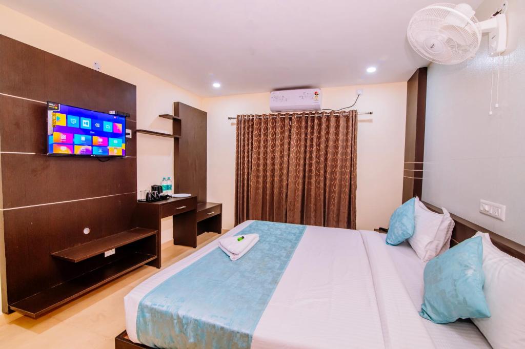 Postel nebo postele na pokoji v ubytování Hotel Shams Inn