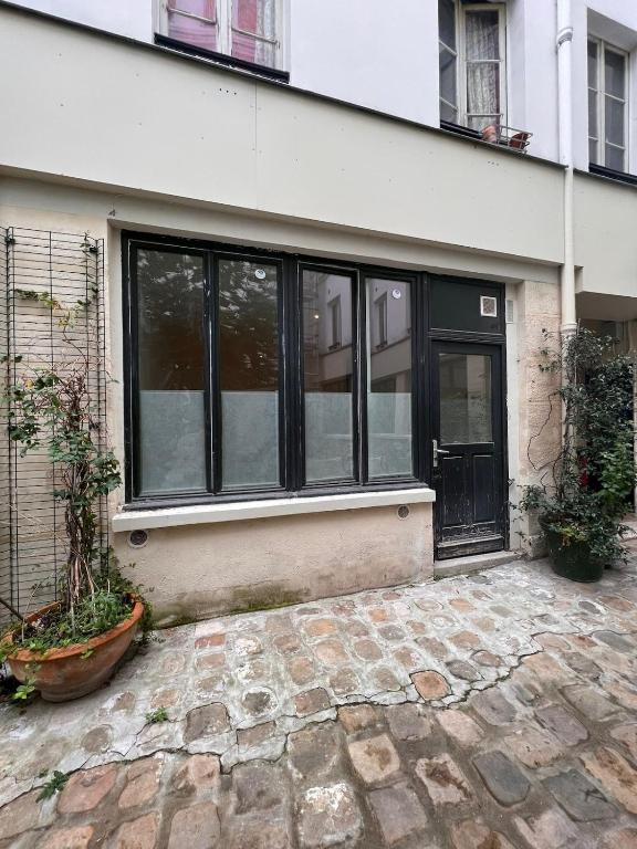 Studio lumineux sur cour à Bastille