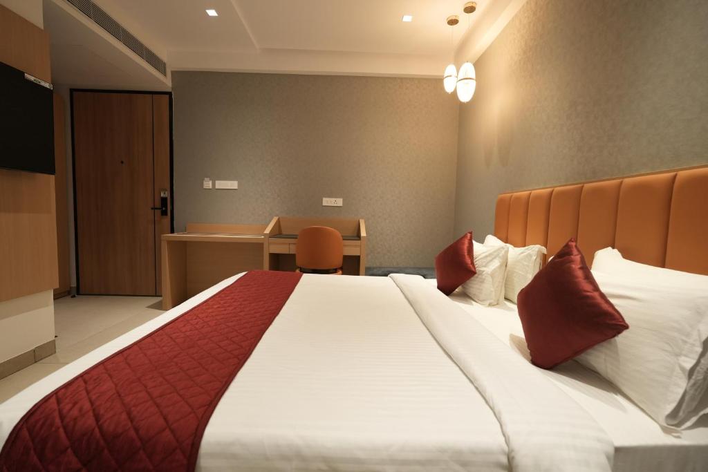 Postel nebo postele na pokoji v ubytování Hotel Cachet