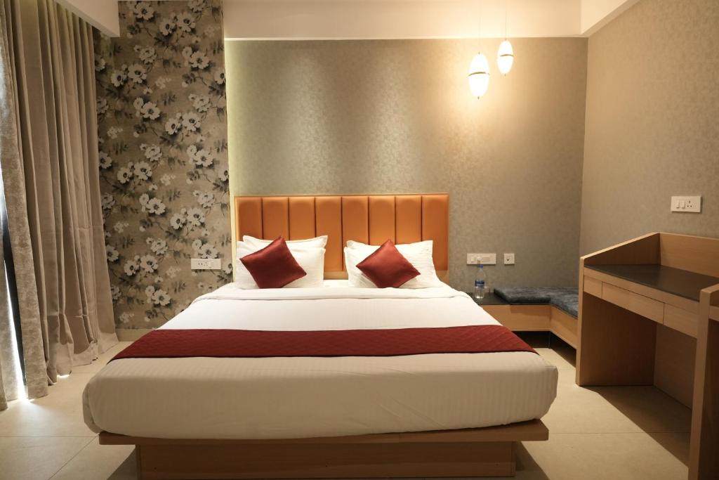 Postel nebo postele na pokoji v ubytování Hotel Cachet