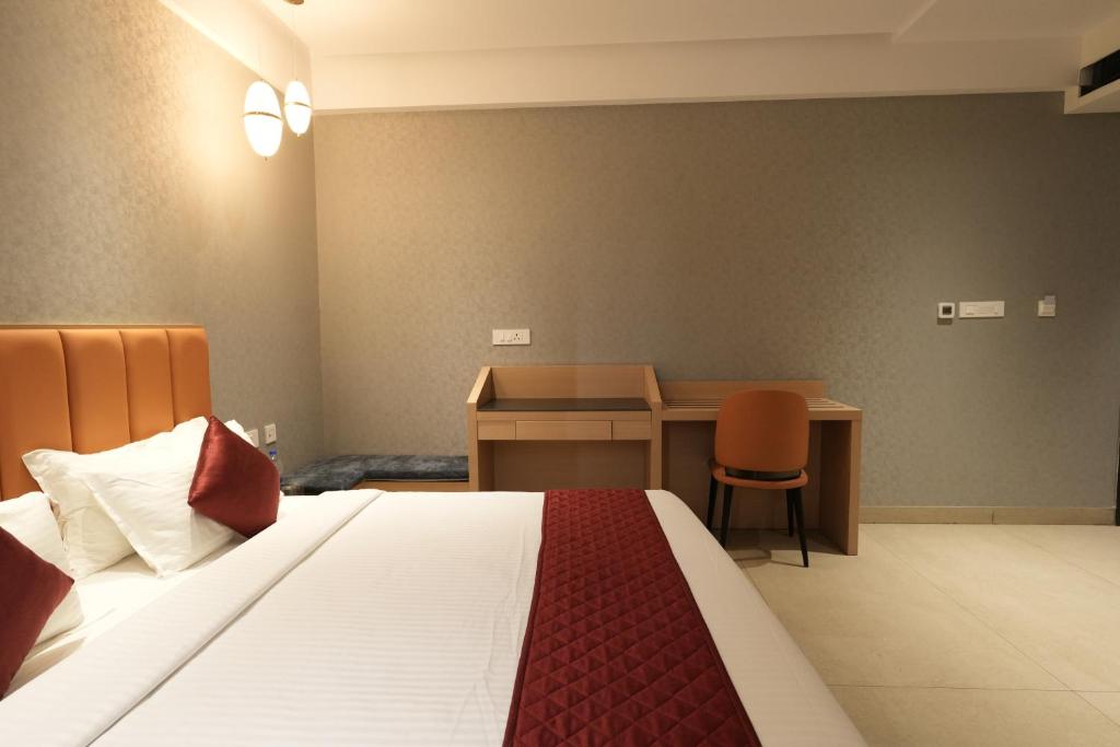 Postel nebo postele na pokoji v ubytování Hotel Cachet