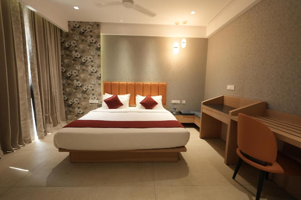 Postel nebo postele na pokoji v ubytování Hotel Cachet