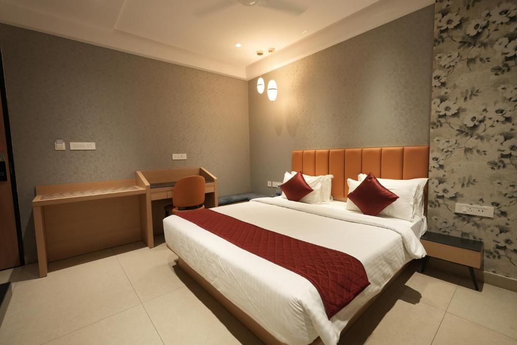 Postel nebo postele na pokoji v ubytování Hotel Cachet