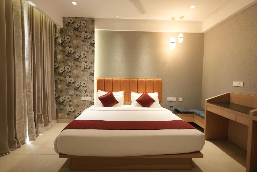 Postel nebo postele na pokoji v ubytování Hotel Cachet