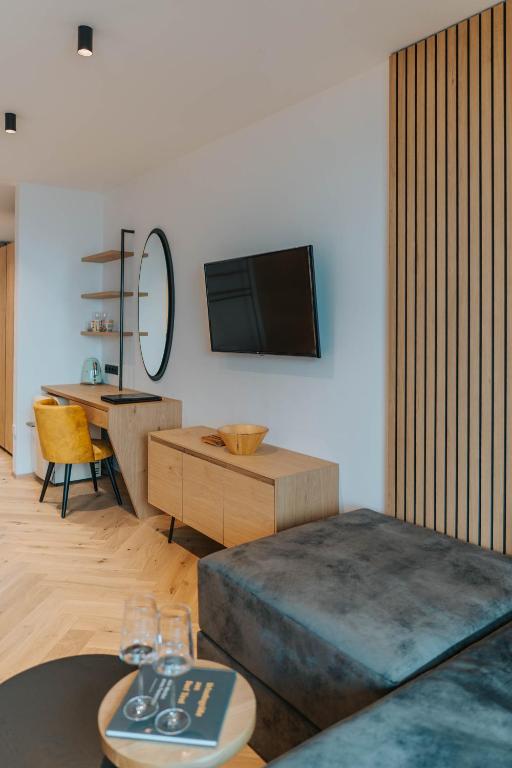 TV a/nebo společenská místnost v ubytování Small Hotel Sonne