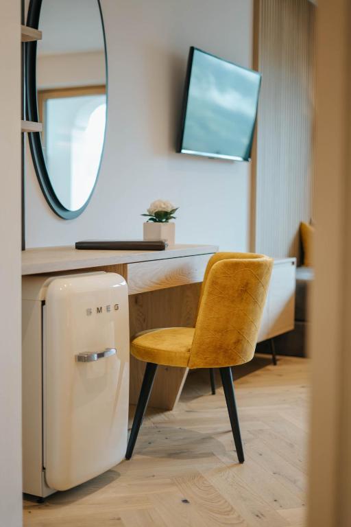 TV a/nebo společenská místnost v ubytování Small Hotel Sonne