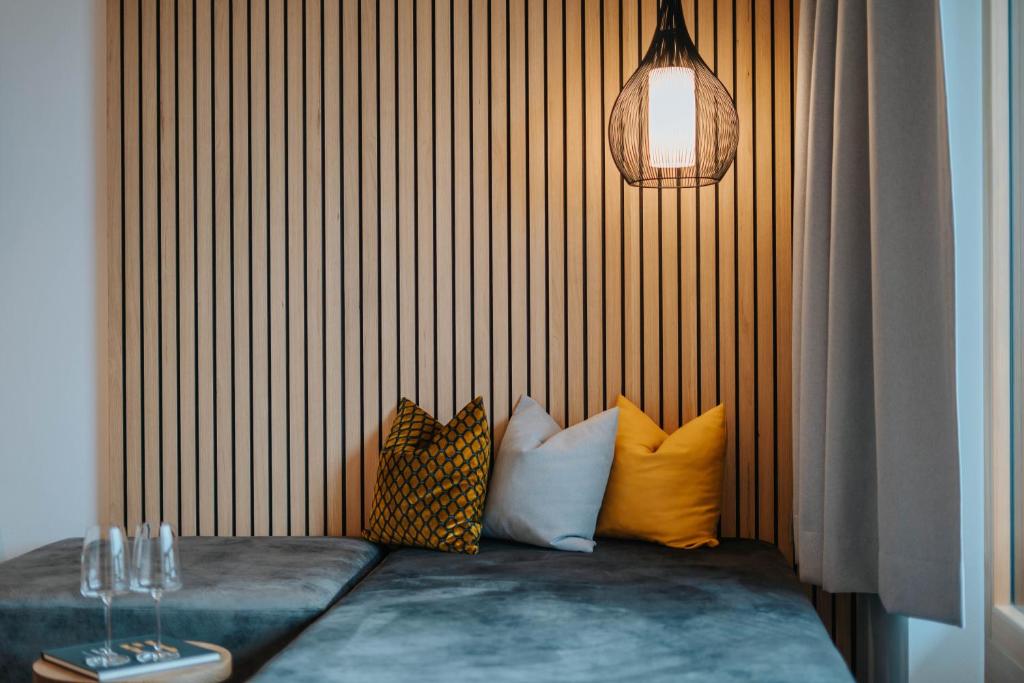 Postel nebo postele na pokoji v ubytování Small Hotel Sonne