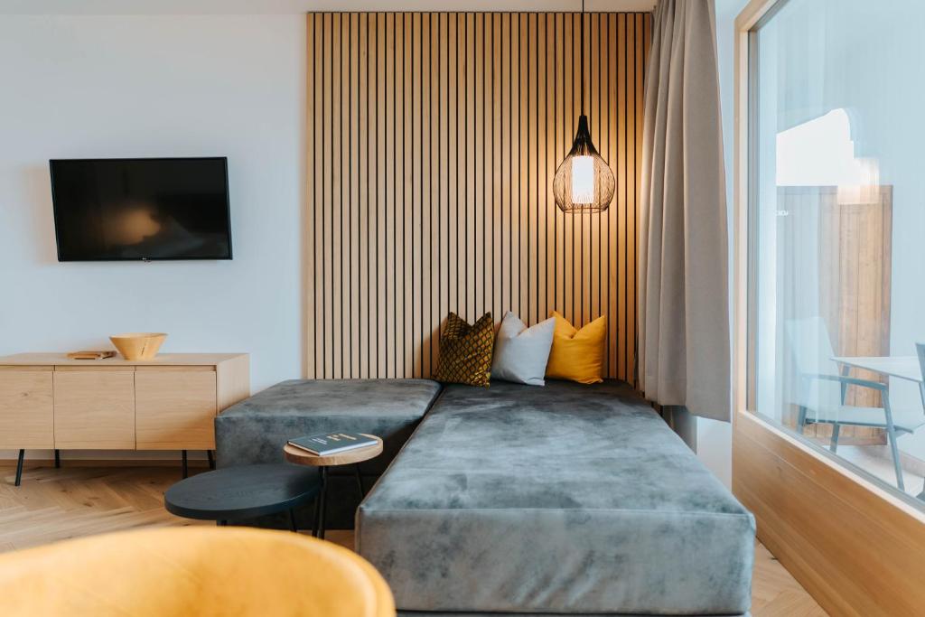 Postel nebo postele na pokoji v ubytování Small Hotel Sonne
