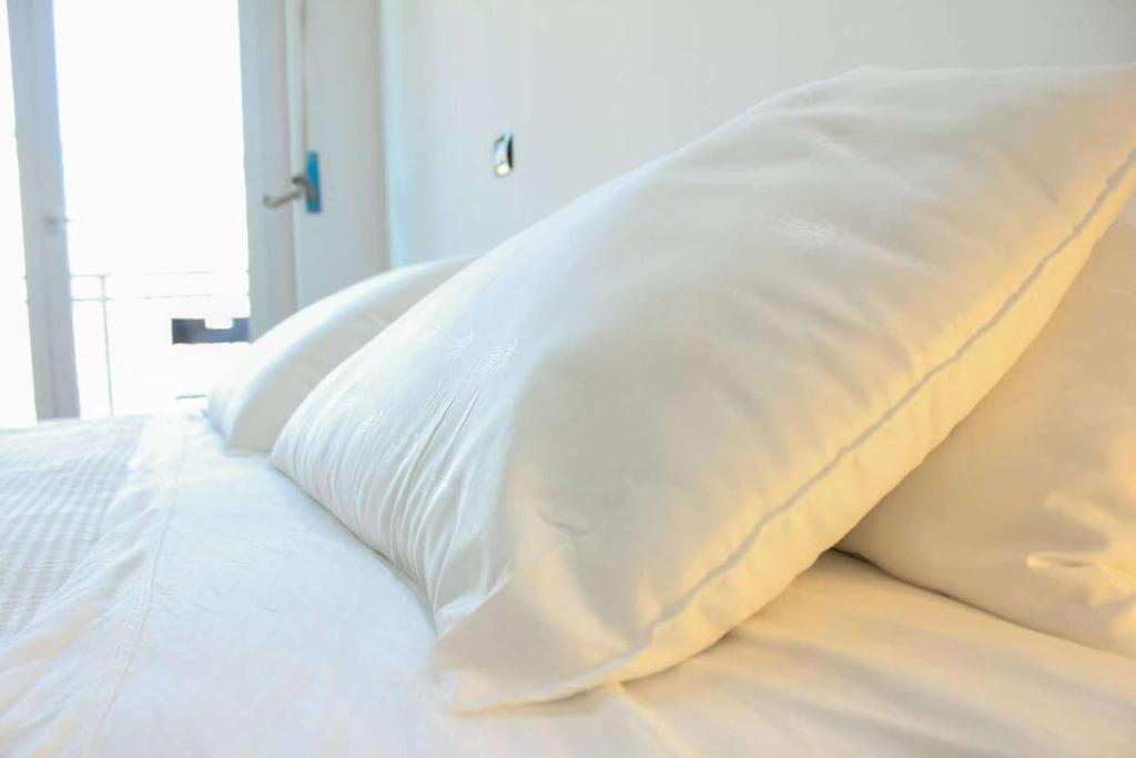 Postel nebo postele na pokoji v ubytování Monolocale in bicocca