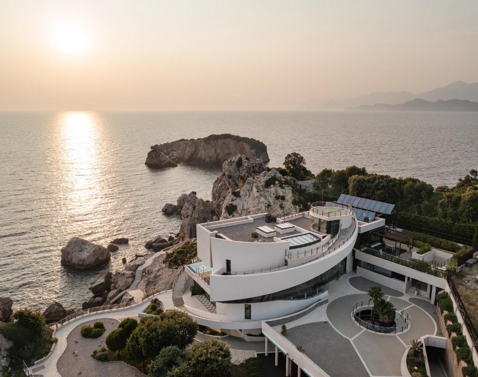 an aerial view of a building next to the ocean at CONTiNUUM in Ulcinj