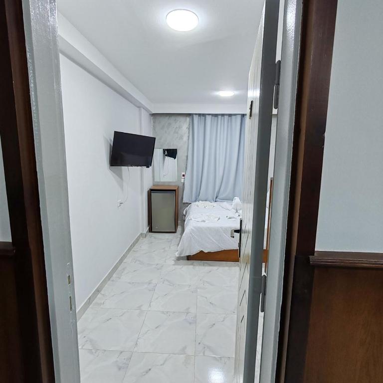 Postel nebo postele na pokoji v ubytování del ceilo hotell