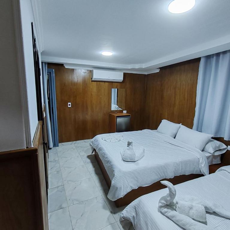 Postel nebo postele na pokoji v ubytování del ceilo hotell