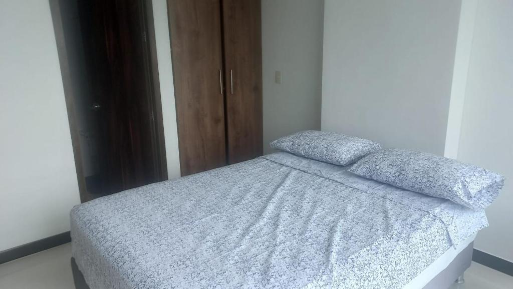 Postel nebo postele na pokoji v ubytování Amplio apartamento con ubicación inmejorable