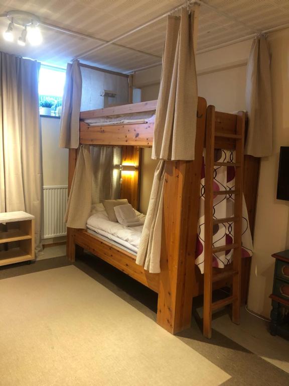 Postel nebo postele na pokoji v ubytování Målkullorna Hostel