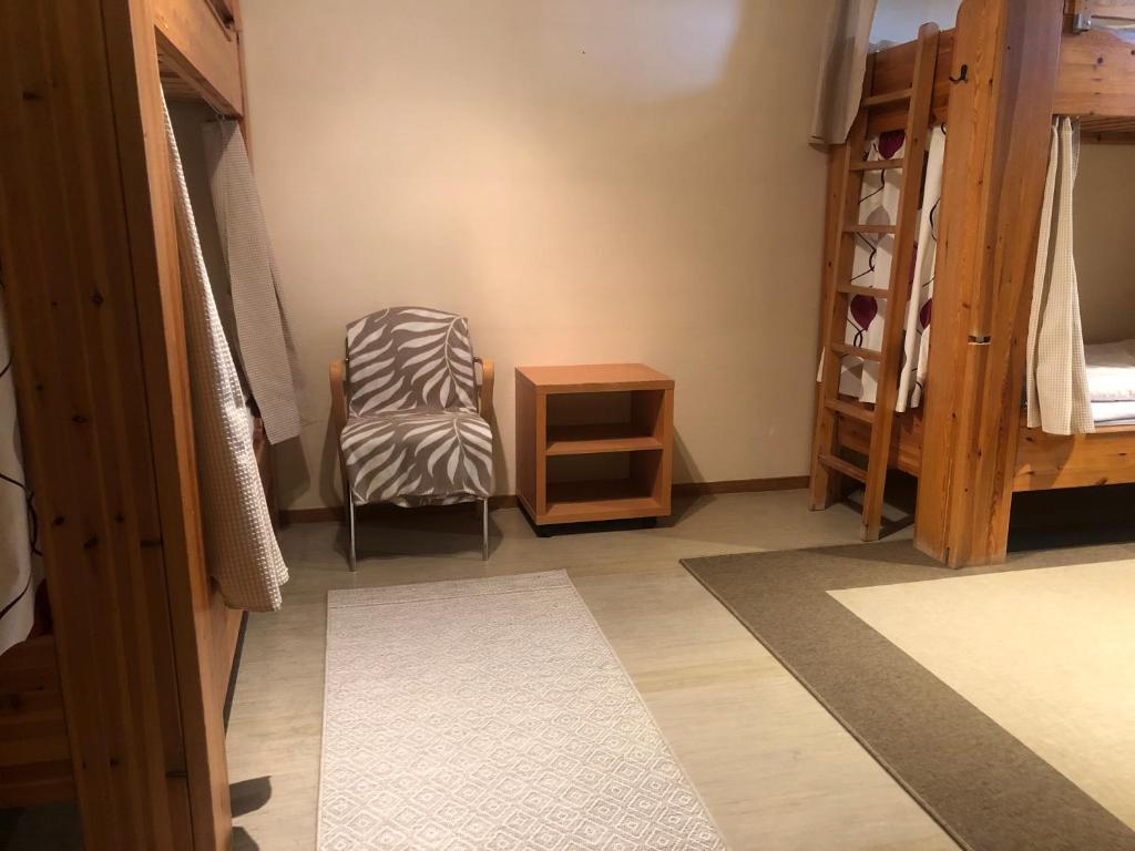 Postel nebo postele na pokoji v ubytování Målkullorna Hostel