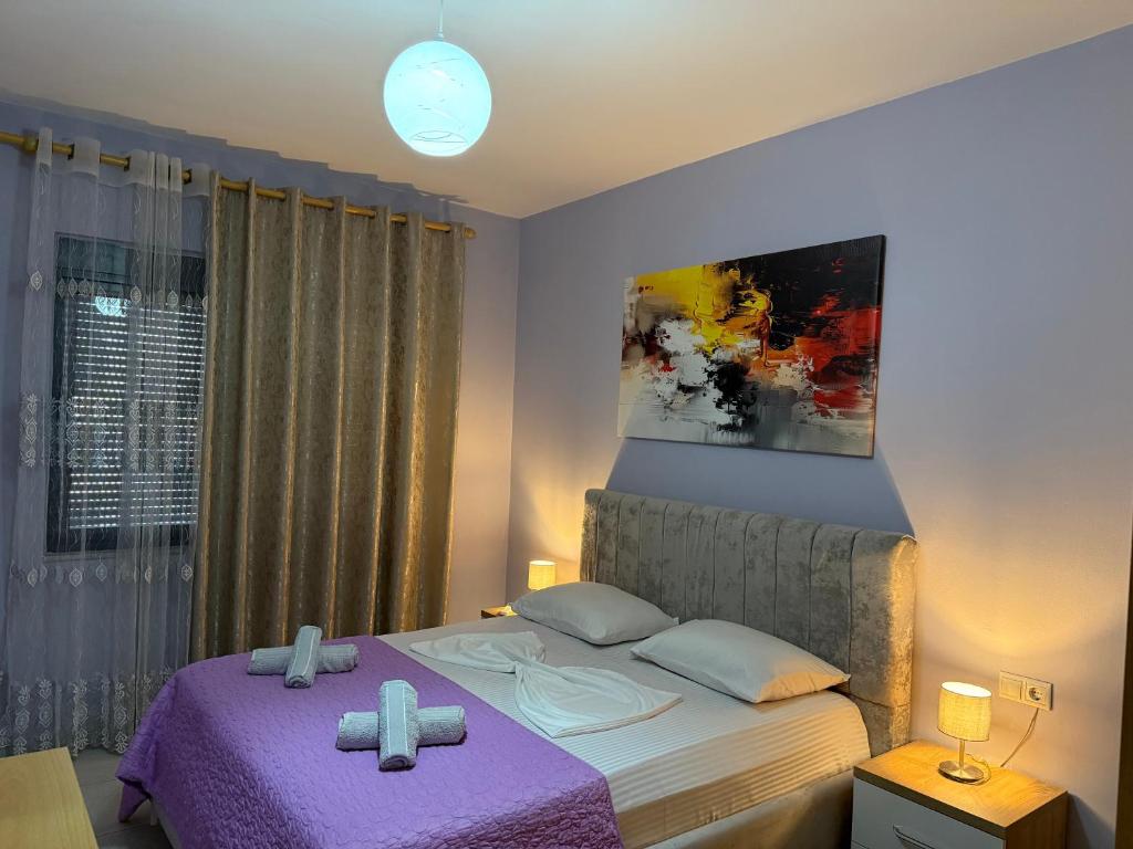 Ένα ή περισσότερα κρεβάτια σε δωμάτιο στο Marinela Apartment 2