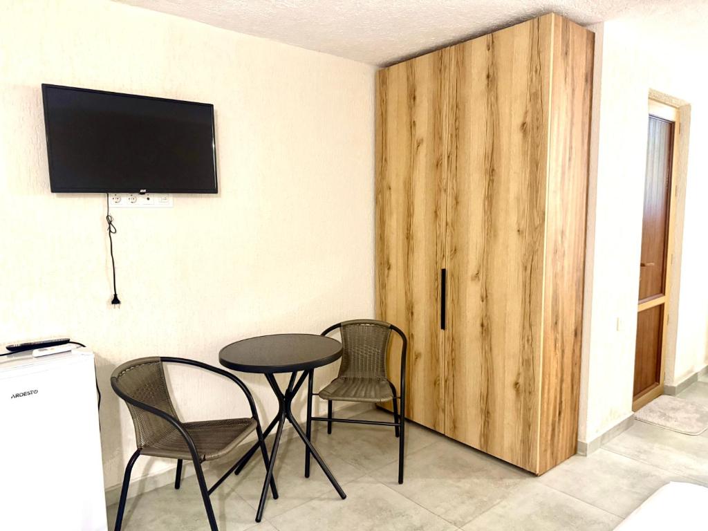 TV a/nebo společenská místnost v ubytování Hotel Barbare
