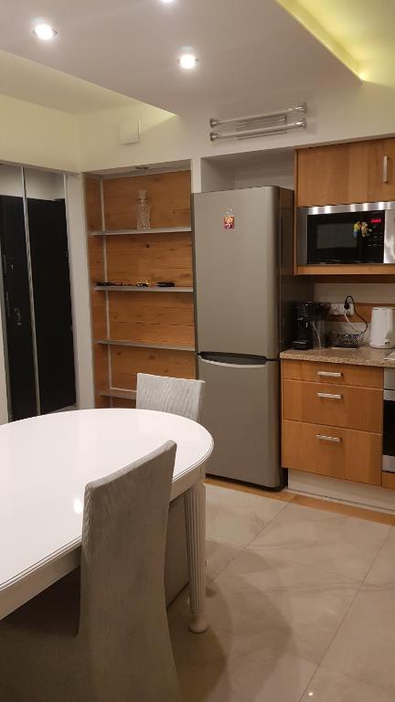 Kuchyňa alebo kuchynka v ubytovaní Apartamenty Toporowa Cyrhla