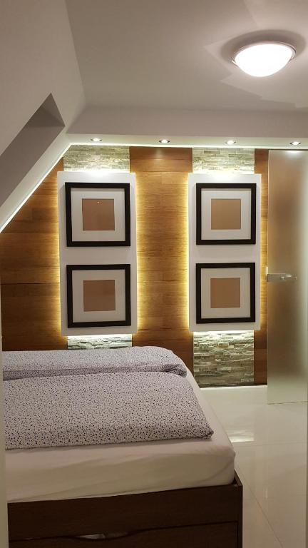 Posteľ alebo postele v izbe v ubytovaní Apartamenty Toporowa Cyrhla